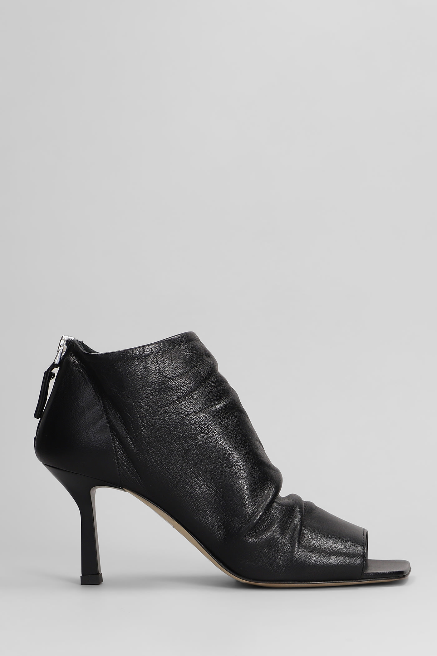 THE SELLER HIGH HEELS ANKLE BOOTS IN BLACK LEATHER