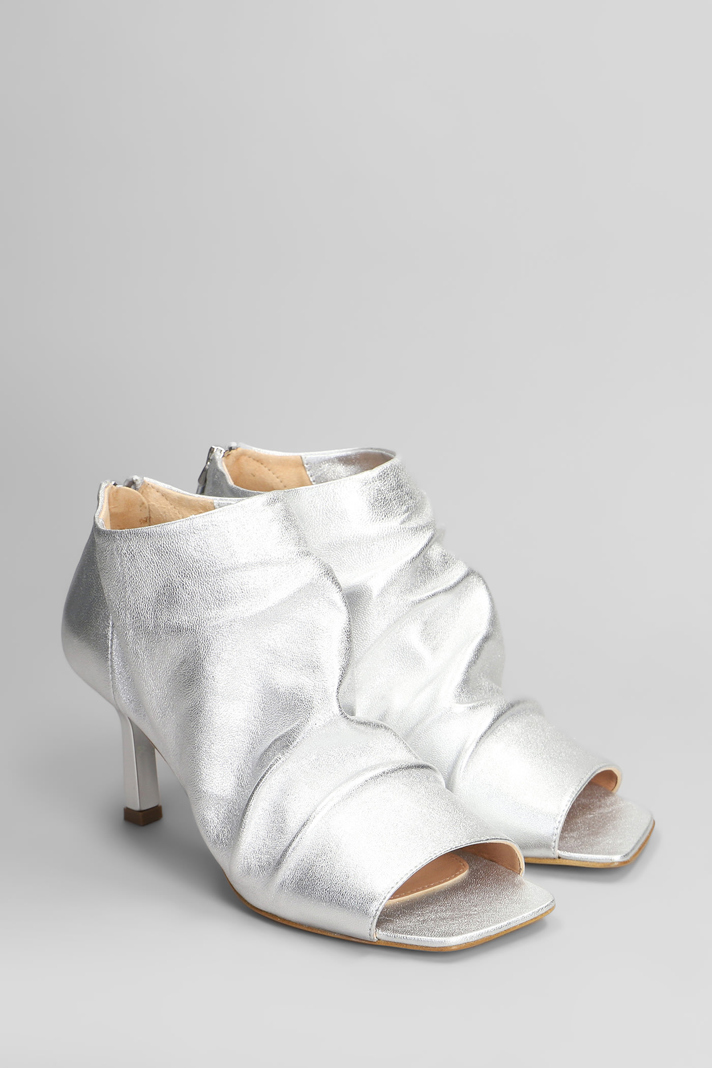 THE SELLER HIGH HEELS ANKLE BOOTS IN SILVER LEATHER
