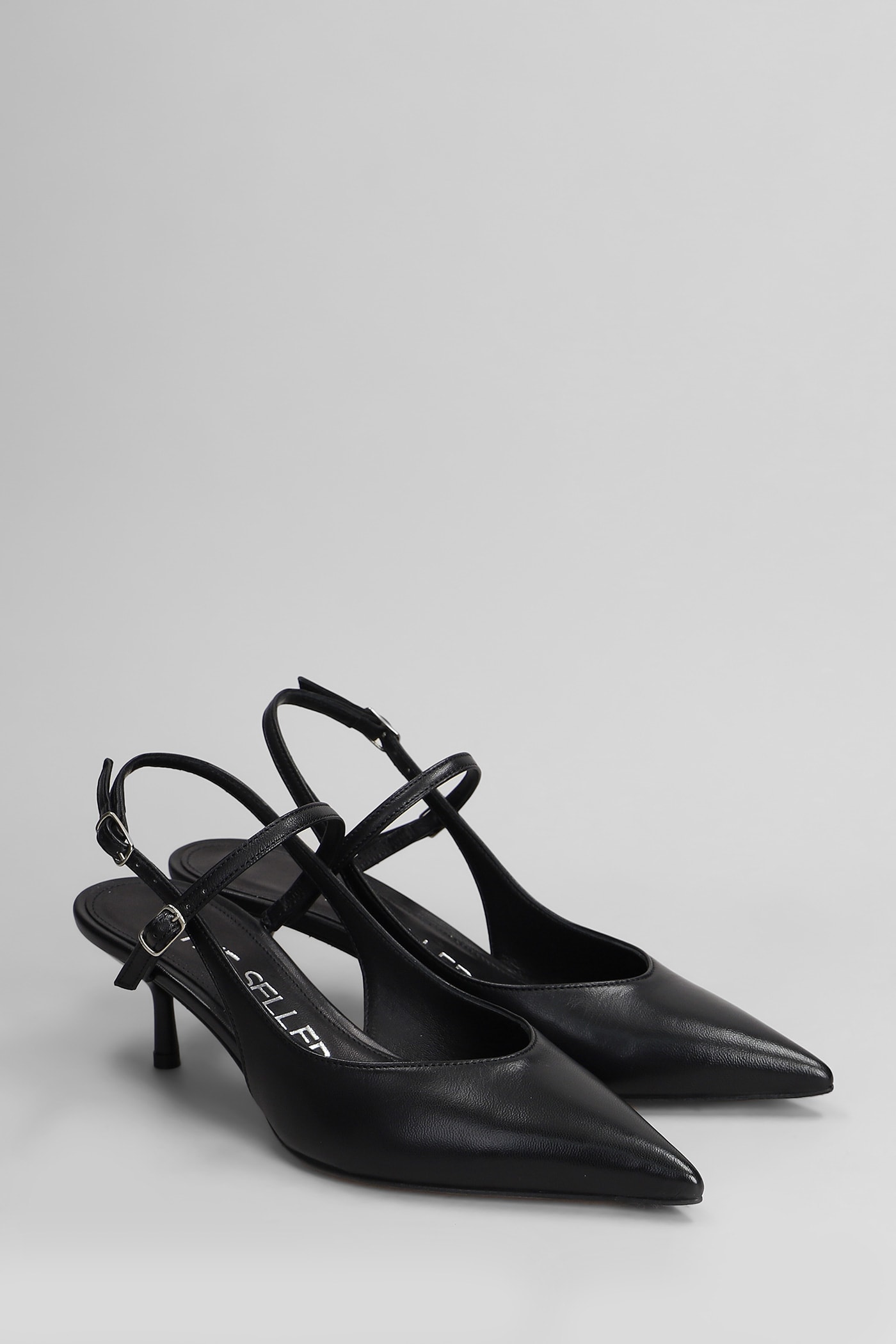 Shop The Seller Pumps In Black Leather